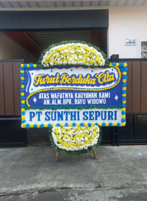 Papan Bunga Duka di Sela