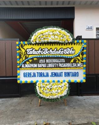Papan Bunga Duka di Sela