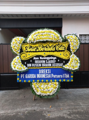 Papan Bunga Duka di Sela
