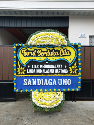 Papan Bunga Duka di Sela