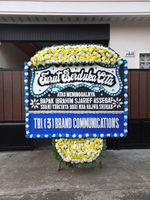 Papan Bunga Duka di Sela